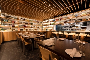Boqueria’s private dining room on West 40th street with a view of the kitchen from the chef’s counter.