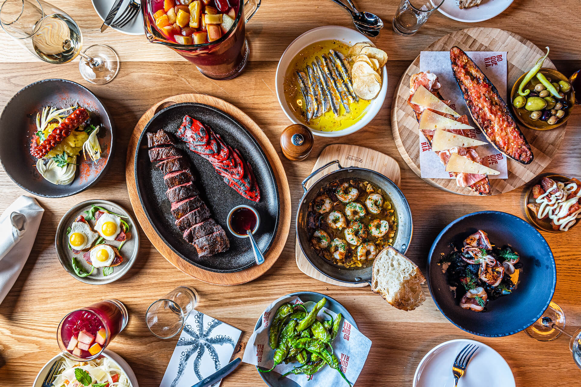 Image of Boqueria table filled with food