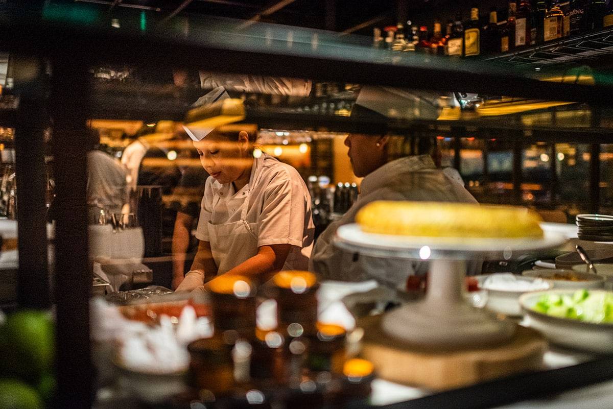Inside Boqueria: the open kitchen and bar that anchor the Flatiron room